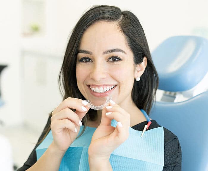 "Invisalign dentist at Inland Choice Dental in Riverside, CA, offering clear aligner orthodontic treatment for straighter teeth.
